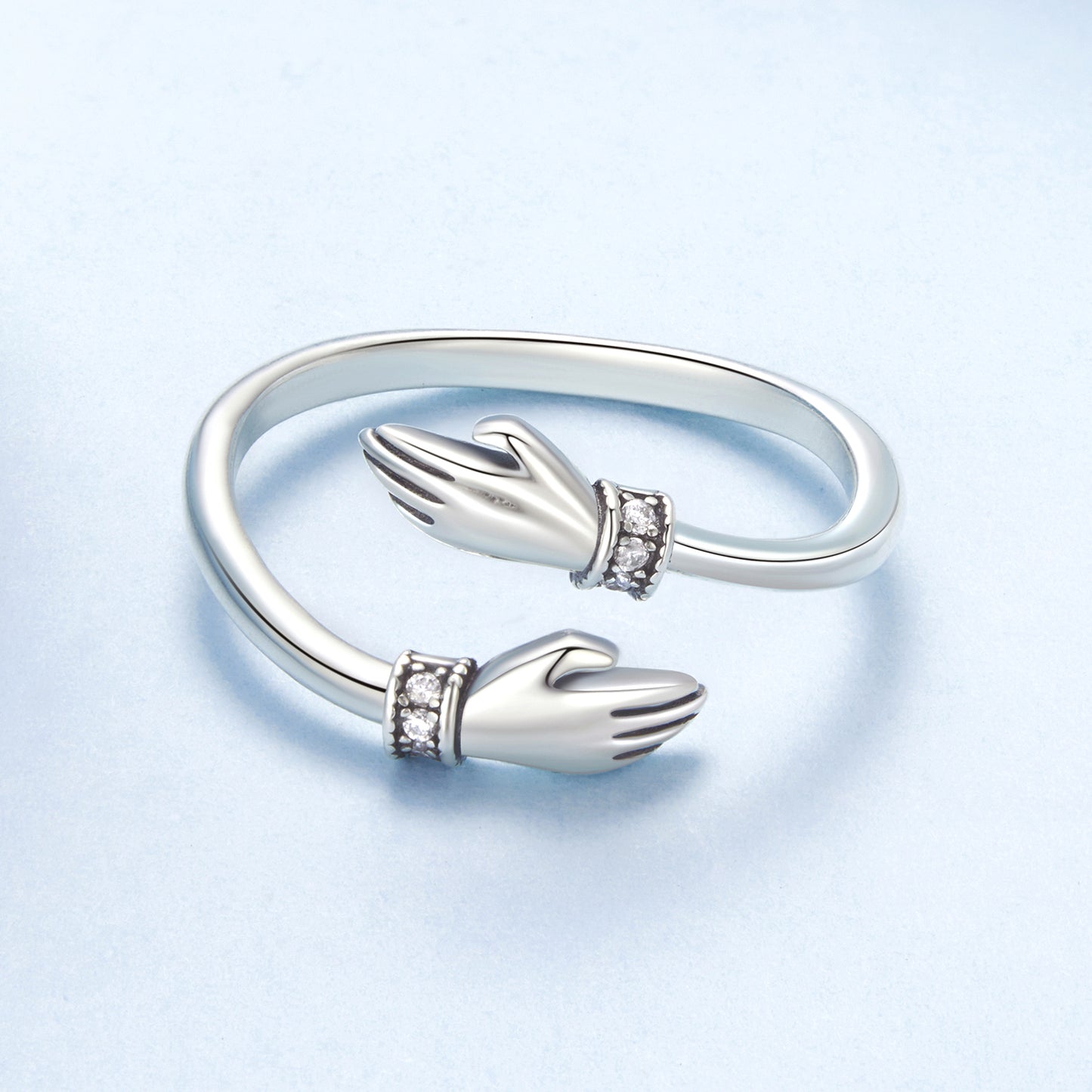 symbolic hug ring silver minimalist style