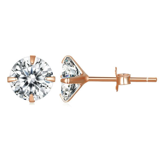 Rose gold stud earrings with clear gemstones on a white background